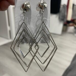 Clip earrings in silver and gold both for the price of one they are new